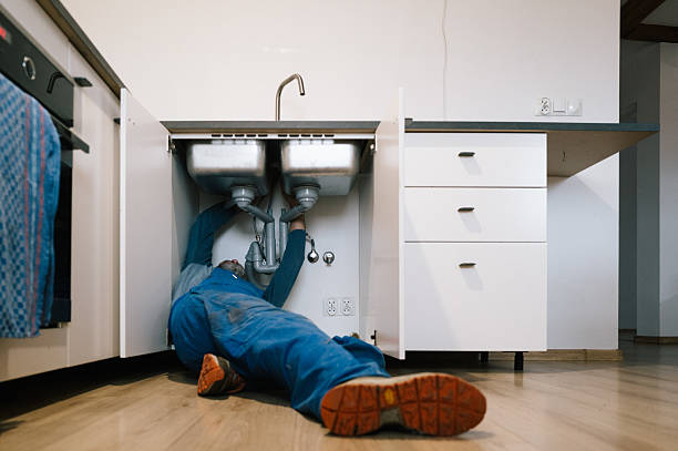 Professional Emergency Plumber technician working in Oregon, IL